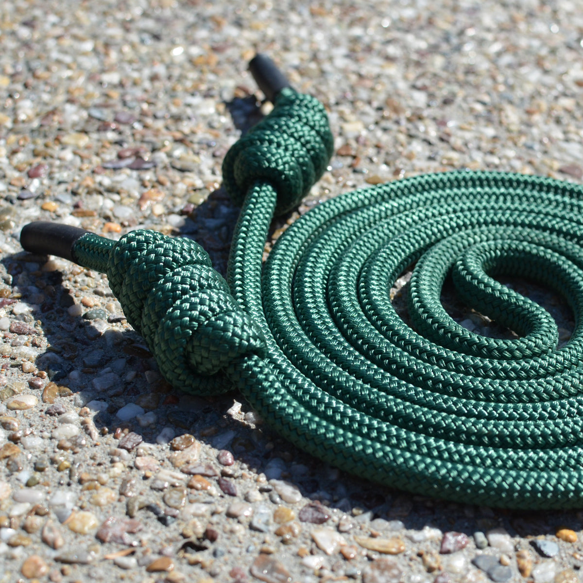Close-up of green Spiral Flow 10mm double-braided flow rope showing soft dense texture ideal for low-load rotational practice. 
