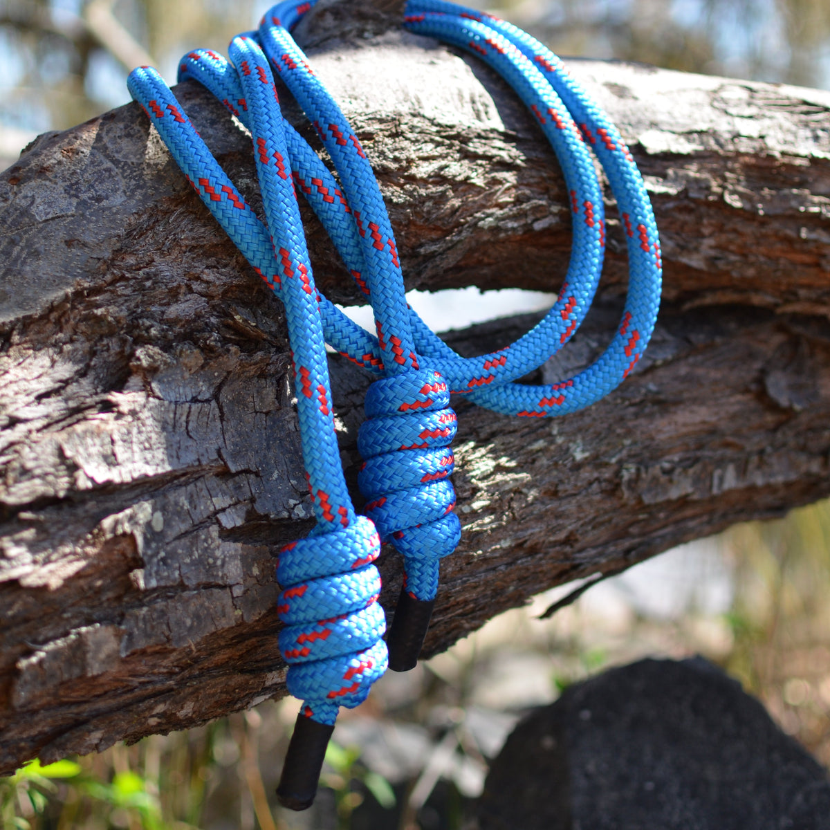 Close-up of Spiral Flow 12mm double-braided flow rope showing soft dense texture ideal for rotational movement practice. Azure Kingfisher