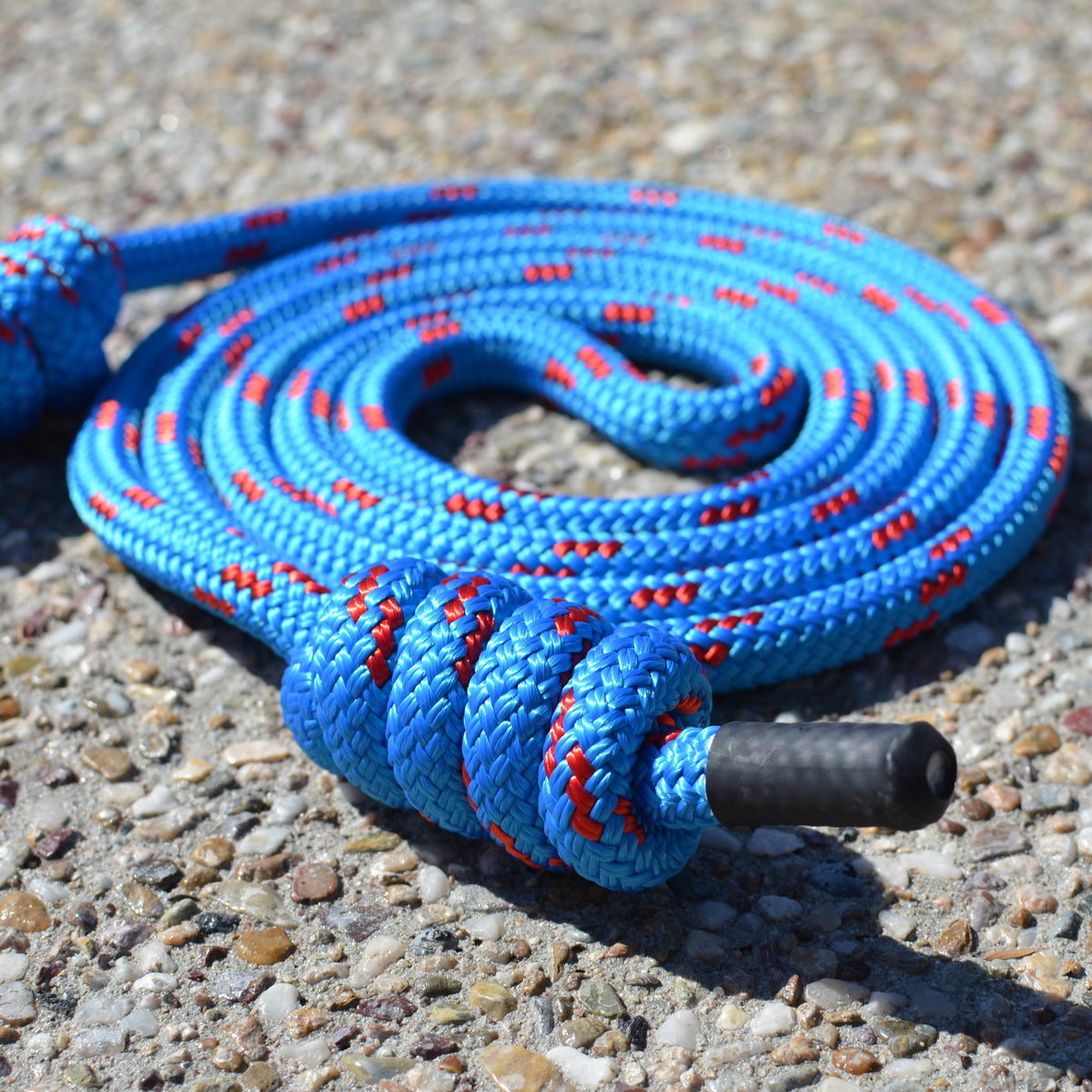 Close-up of Spiral Flow 12mm double-braided flow rope showing soft dense texture ideal for rotational movement practice. Azure Kingfisher